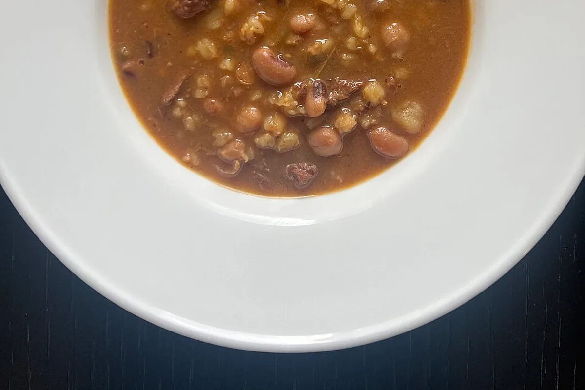 Thick hamin stew with beans and barley