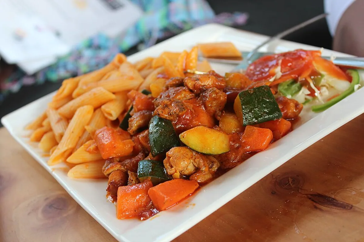 Tomato macaroni beef stew with penne carrots and zucchini