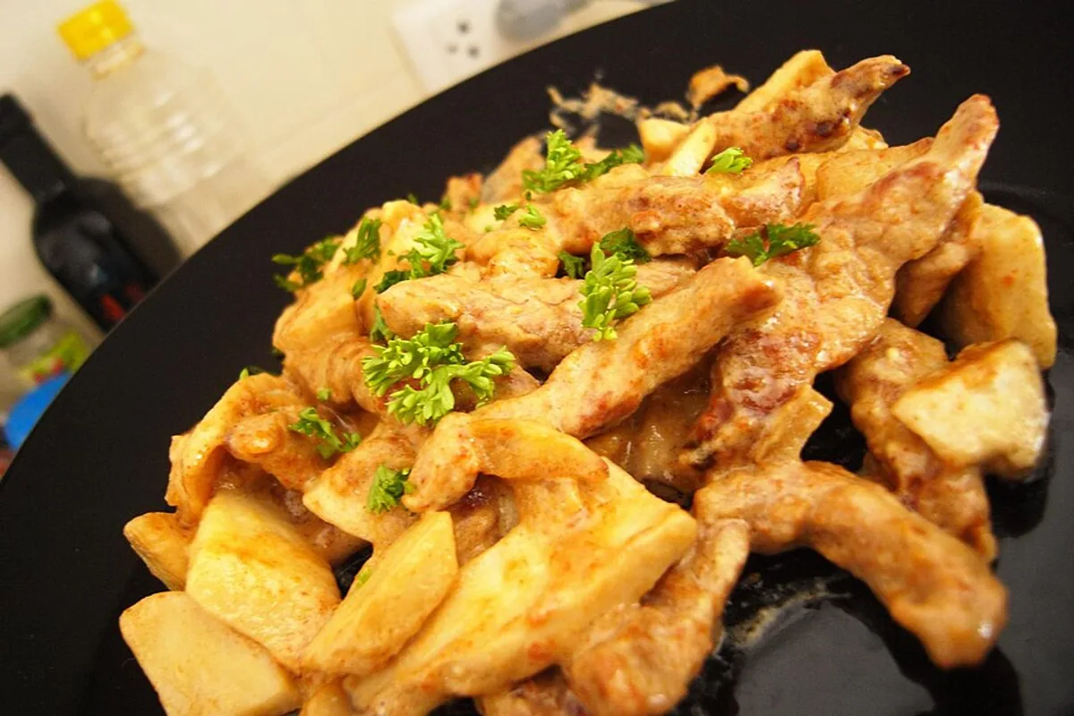 Beef Stroganoff in creamy mushroom sauce with a potato accompaniment