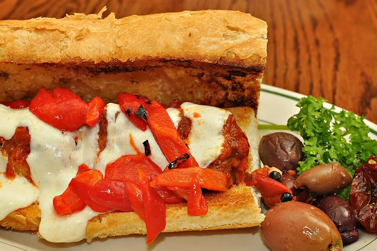 Meatball sub with marinara melted mozzarella and roasted red peppers