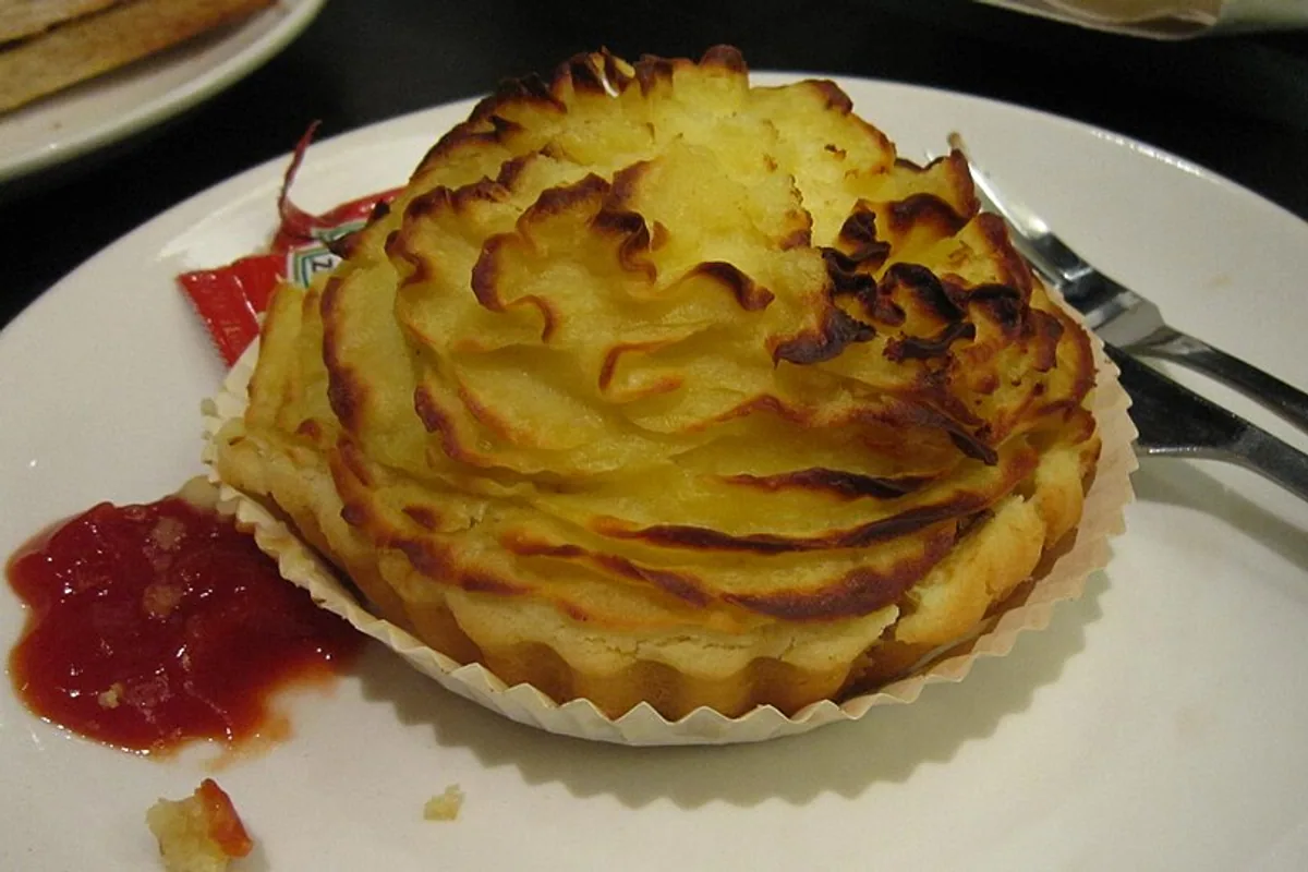 Mushroom pie topped with a browned spiral of mashed potatoes