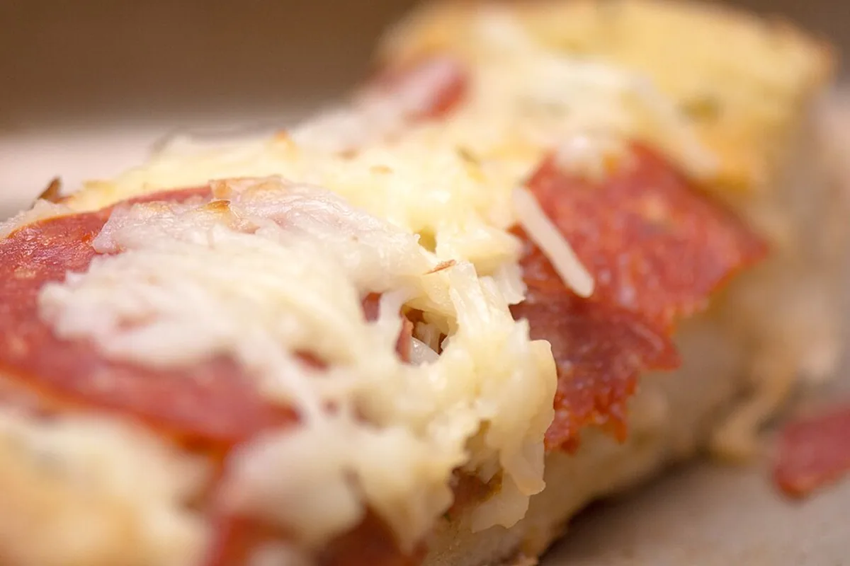 Pepperoni garlic bread pizza with melted mozzarella