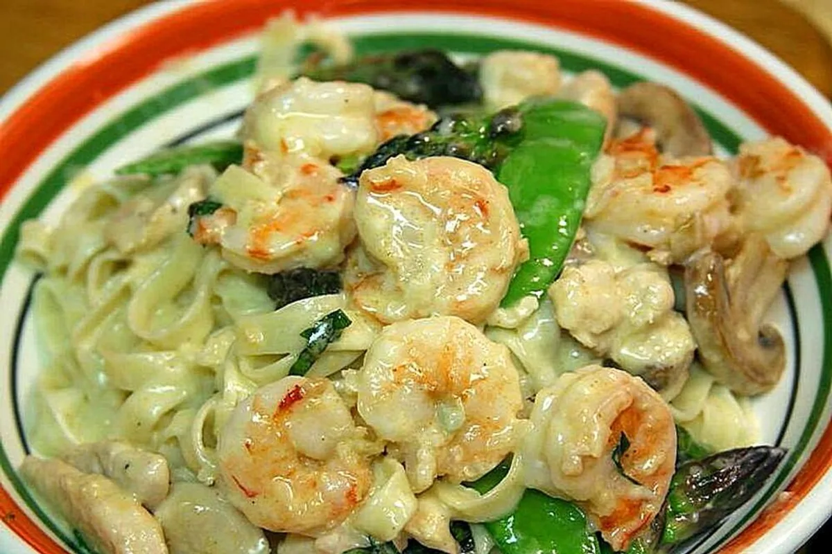 Creamy pasta with shrimp snap peas and herbs