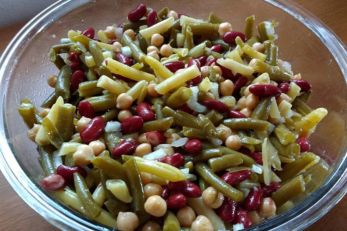 Marinated green bean kidney bean and cannellini bean salad with red onion