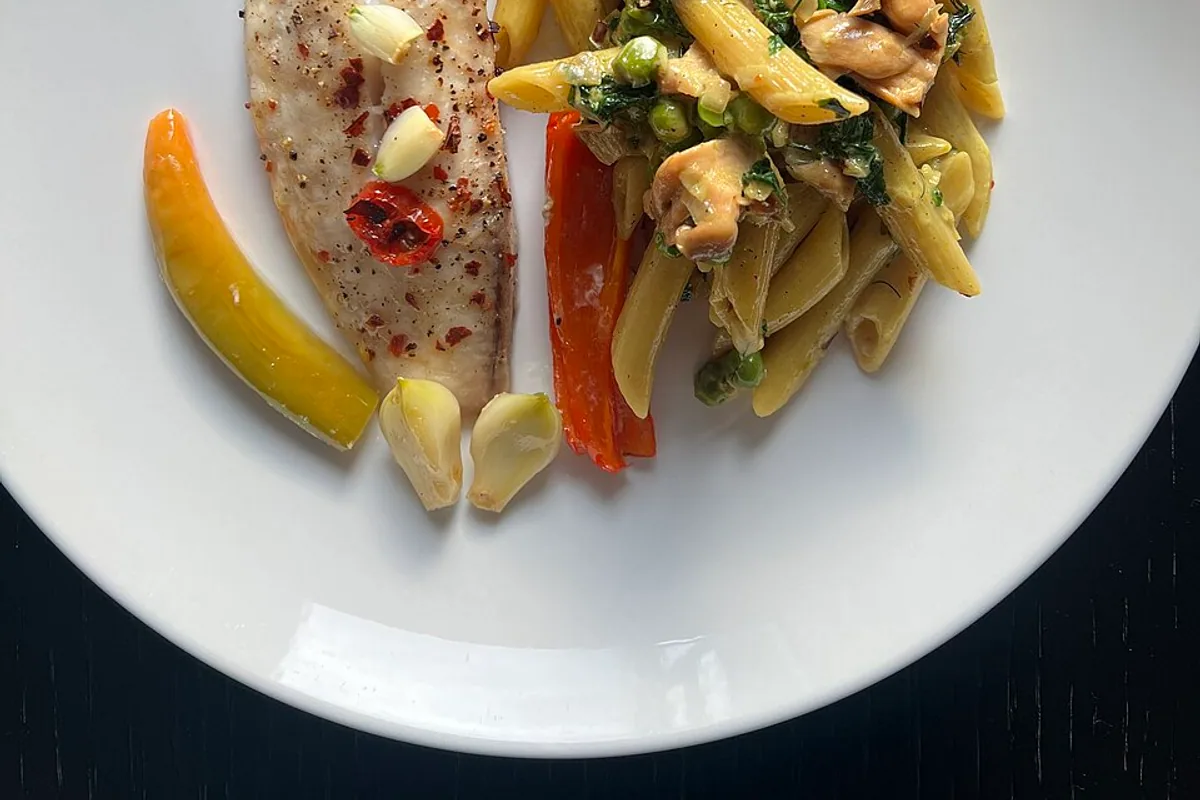Tilapia fillet with pink oyster mushroom penne peppers and lemon