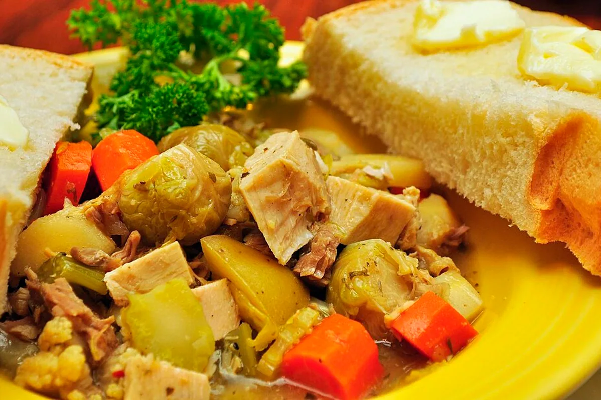 Turkey barley vegetable soup served with toast