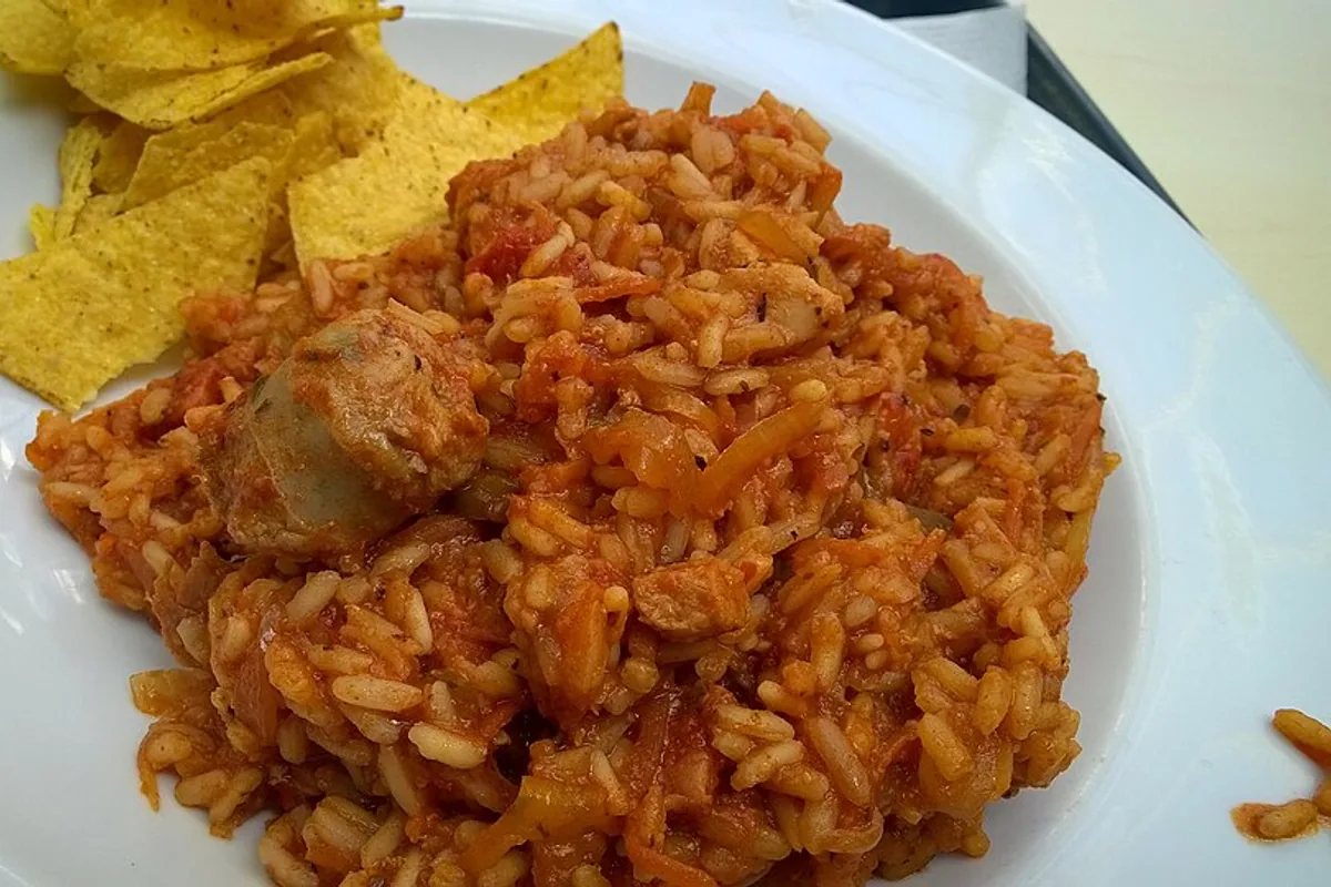 Chicken and sausage jambalaya with tomatoes peppers and rice