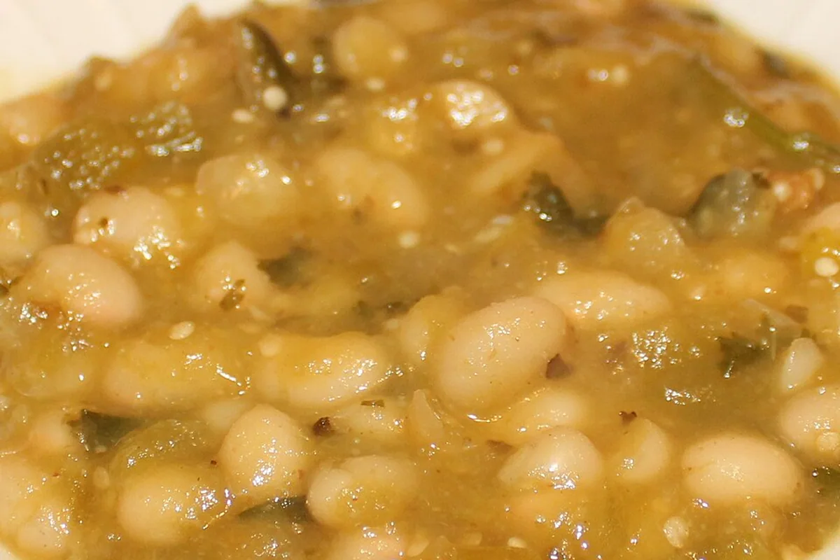 Roasted tomatillo and white bean chili with green herbs