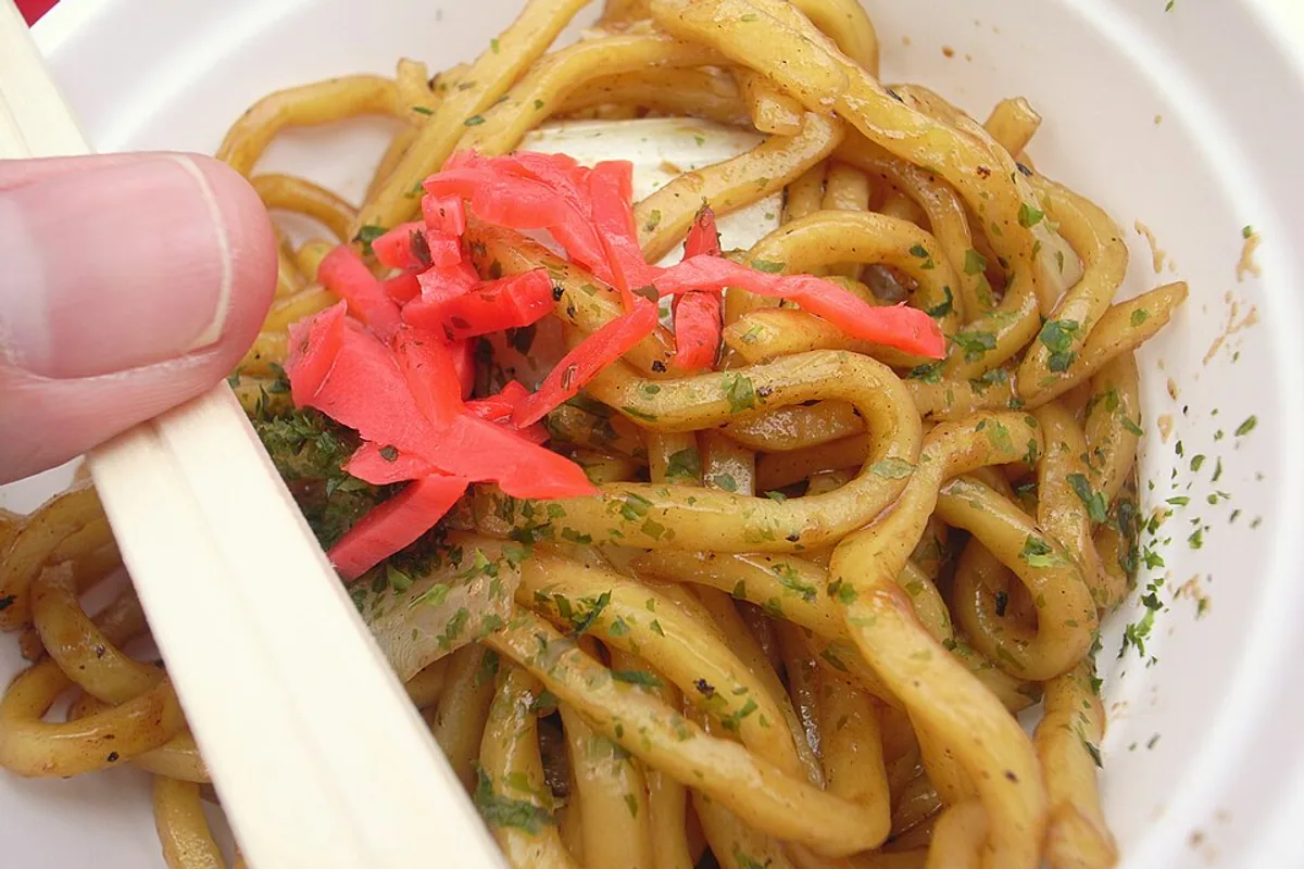 Thick yakisoba noodles with cabbage sauce and red pickled ginger